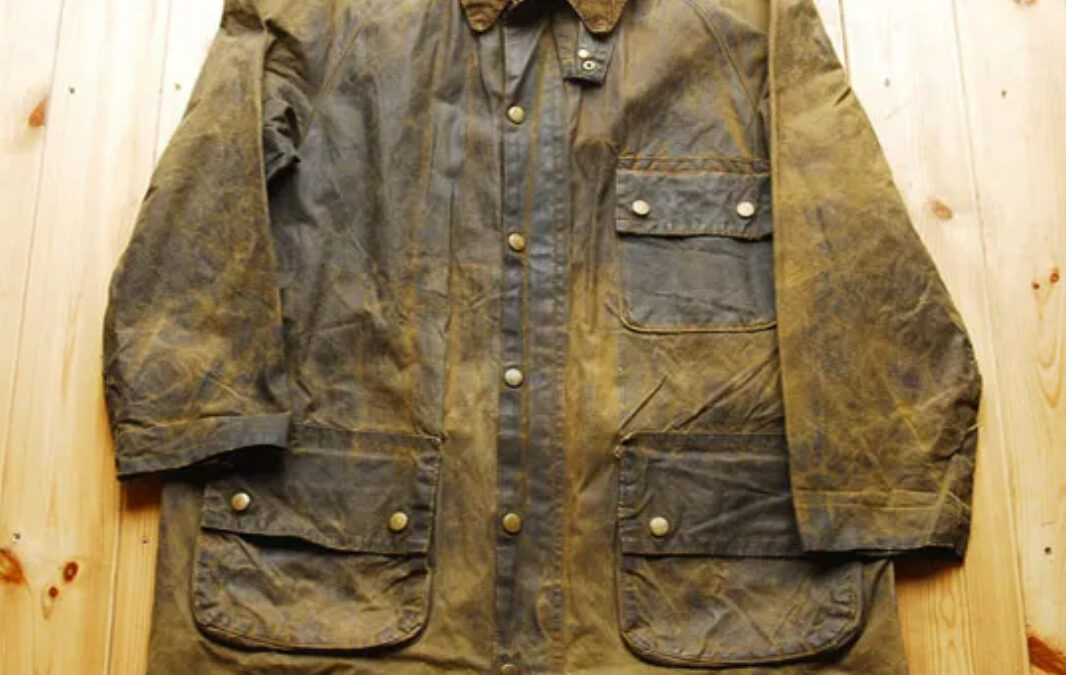 old dirty Barbour jacket representing Kiki Astor's version of the old money aesthetic